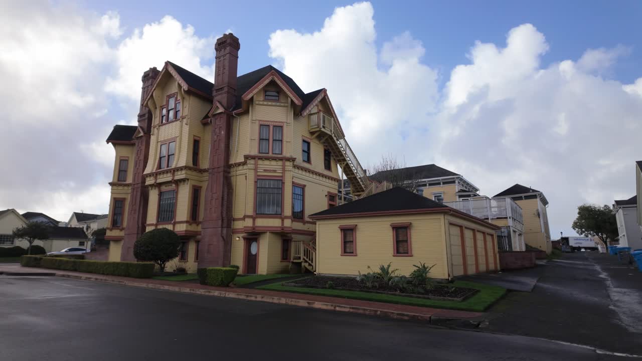 Gimbal wide panning shot of the historic Carter House Victorian mansion in Eureka, California. 4K