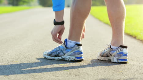 Close-up-runner-man-feet-running-outdoors