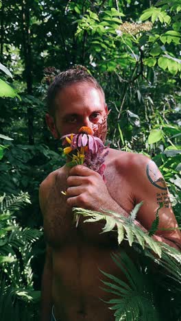 man in forest with flowers