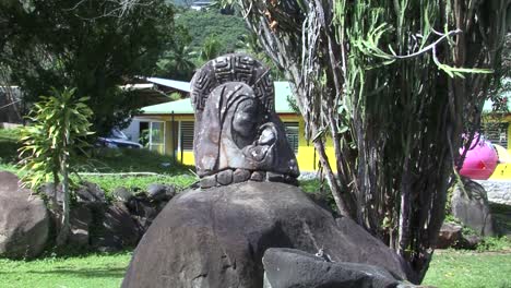 bas-relief virgin mary and baby jesus at notre dame cathedral, nuku hiva, french polynesia