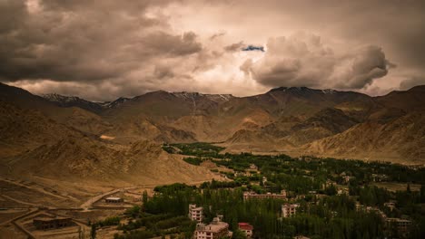 moving shadows and sunlight with cloud formations over leh valley in the himalayas, ladakh, india