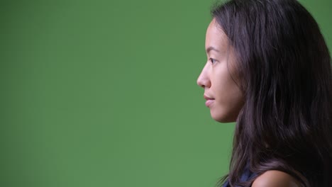 closeup profile view of young beautiful multi-ethnic businesswoman