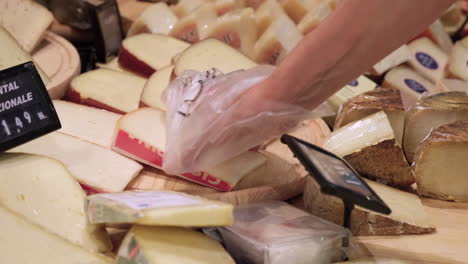 buying cheese at the market