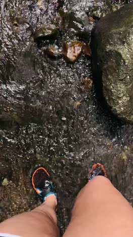 hiking in a mountain stream