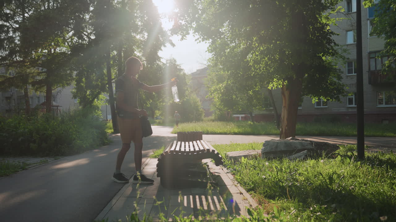 Sunrise Stroll Through Peaceful Neighborhood, Individual Moves Slowly Along Quiet Suburban Pathway At Dawn, Solitary Figure Advances Cautiously On Peaceful Morning Walk Through Suburban Area