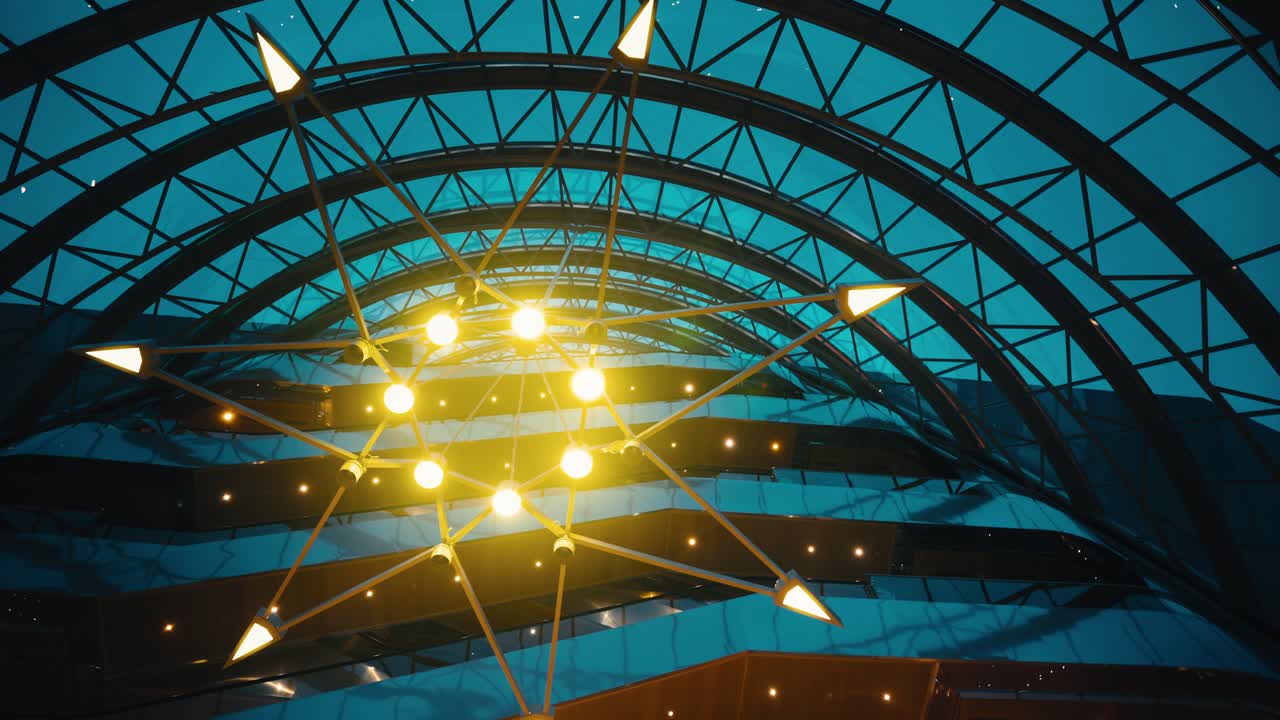 Cinematic futuristic sci fi chandelier in a glass building.