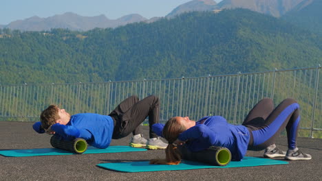 outdoor foam rolling workout for couples