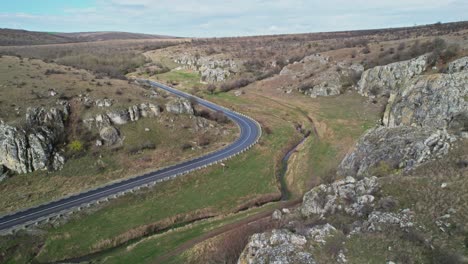 The-rugged-dobrogea-gorges-on-a-clear-day-in-romania,-aerial-view