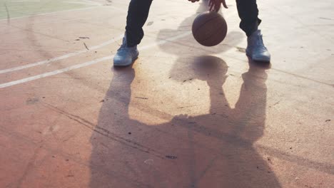 Dribbling-basketball-low-angle-real-time-4K-resolution