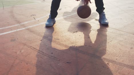 dribbling basketball low angle real time 4k resolution