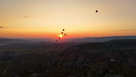 hot air balloons at sunrise over cappadocia's stunning landscape