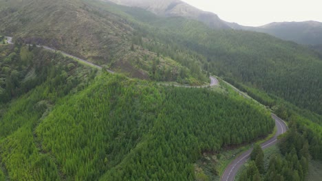 Aerial-view-of-the-path-leading-to-Lake-Fire,-also-known-as-"Lagoa-do-Fogo,"-a-volcanic-lake-on-the-island-of-São-Miguel-in-the-Azores,-Portugal