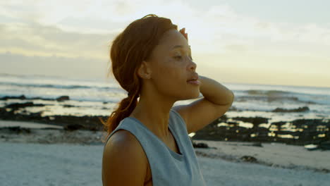 woman relaxing on beach 4k