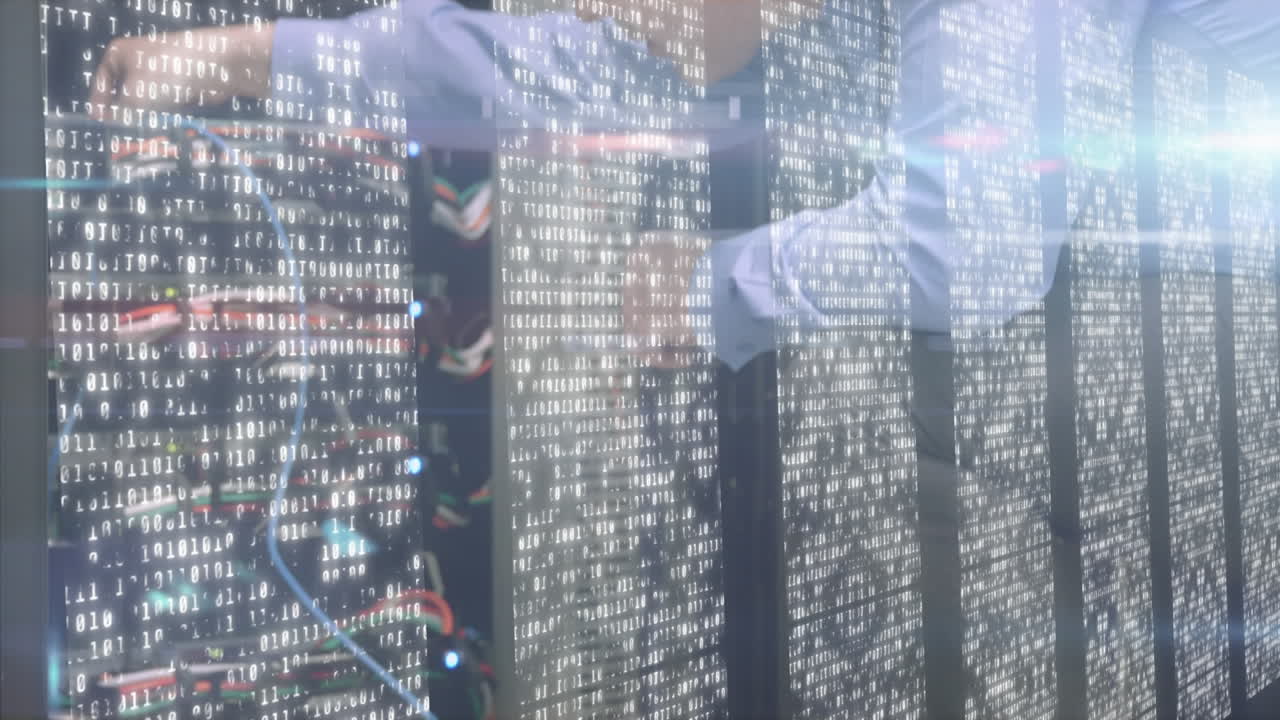 Animation of data with man connecting cables on computers