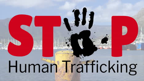 animation of stop human trafficking text over cityscape