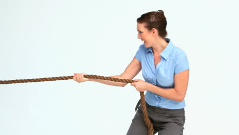 woman in suit pulling a rope