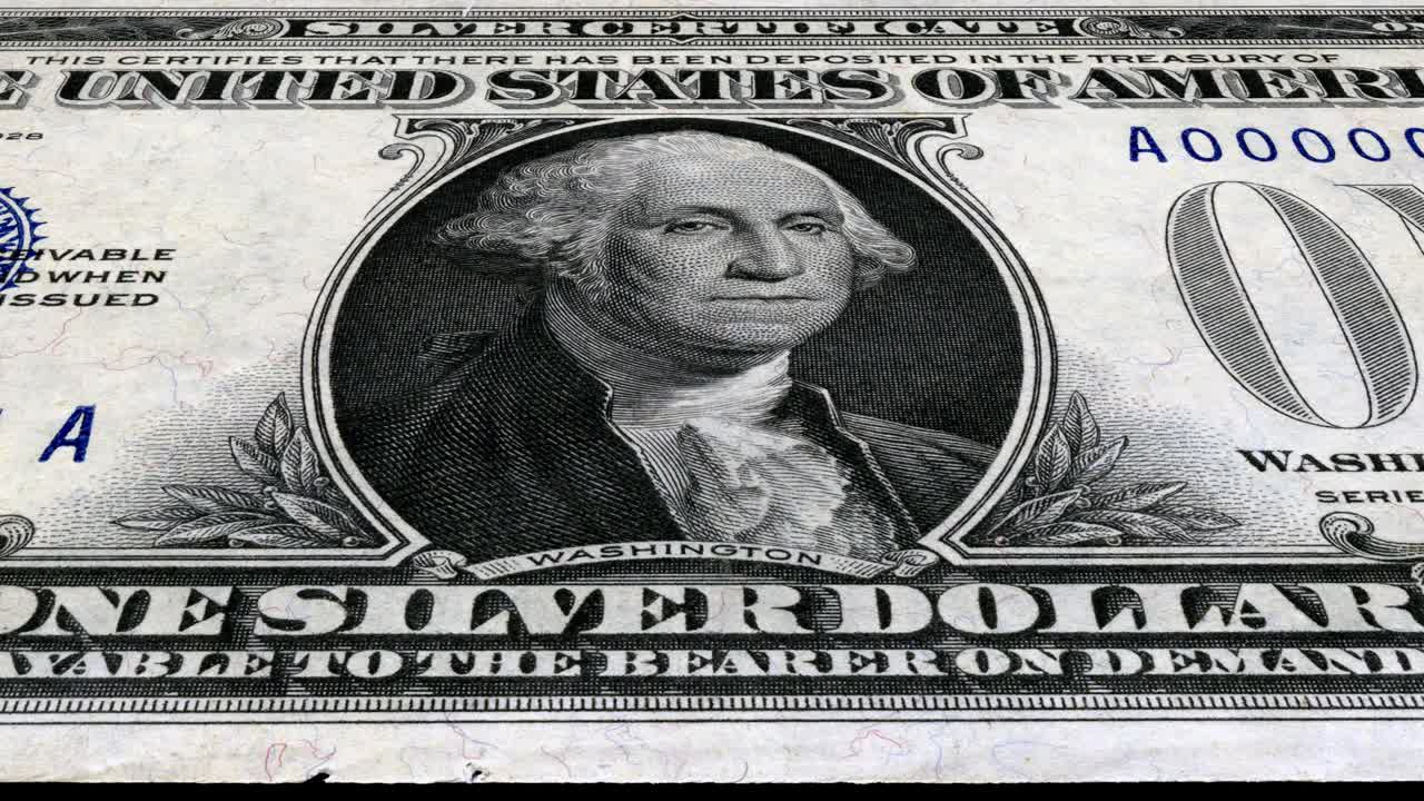 One Dollar and crumpled portrait George Washington on USA money banknote