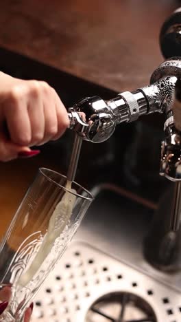 pouring beer at a bar