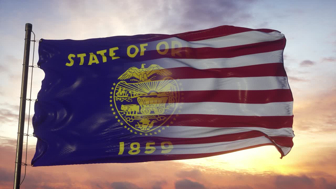 오리건과 미국 국기가 기둥 위에. 미국과 오리건의 혼합 발이 바람에 흔들리고 있다.