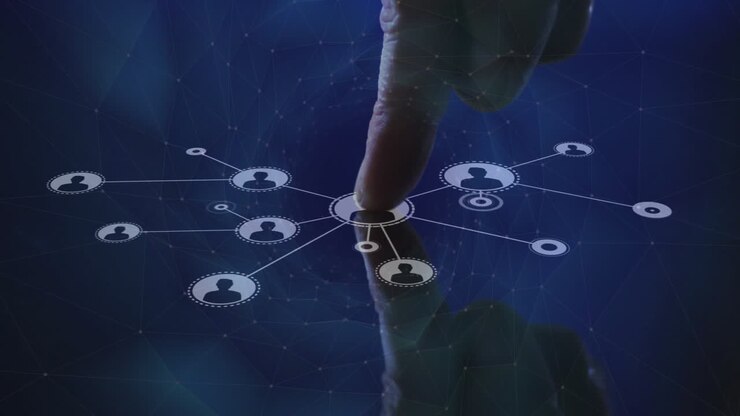 Animation of finger touching network of connections with icons on black background
