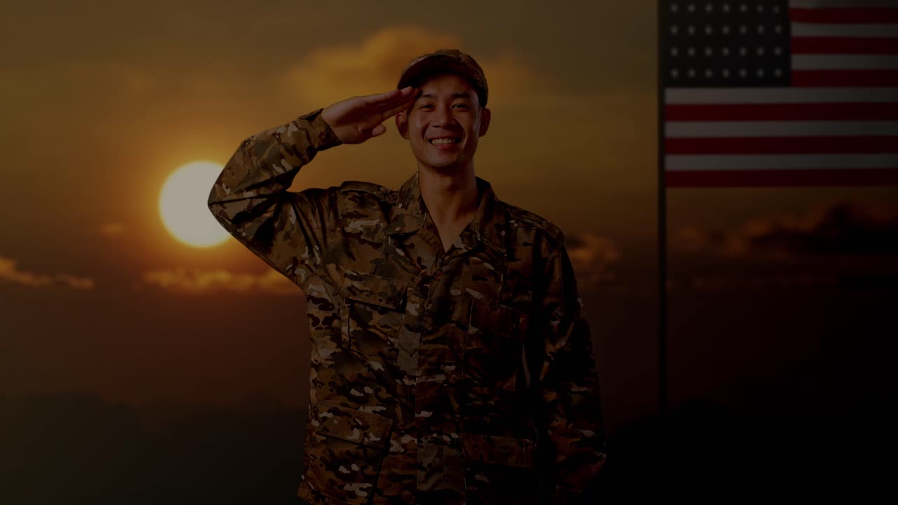 Asian Man Soldier Saluting And Smiling While Standing With Flag Of The United States, Sunset Time