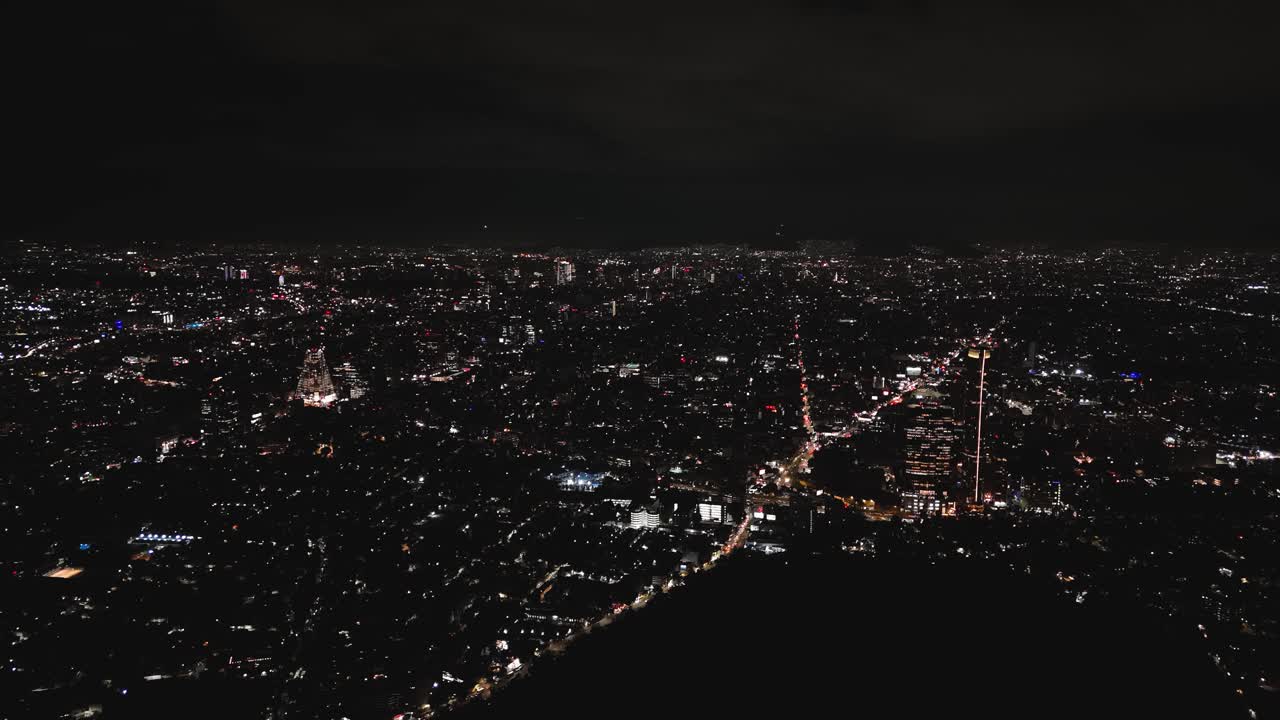 Clear night in Mexico City, high-altitude drone view