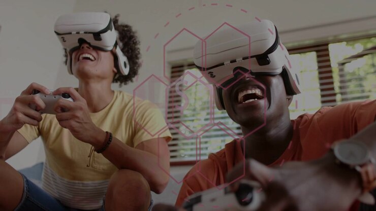 Two men wearing white VR headsets pressing controllers on sofa, activating pink hex HUD and playing