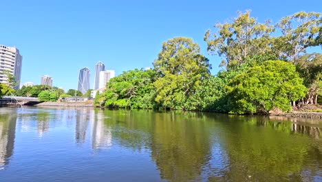 scenic river cruise through lush urban landscape