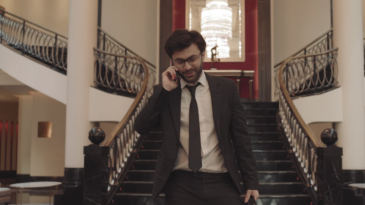 Talking on Phone in Splendid Hotel