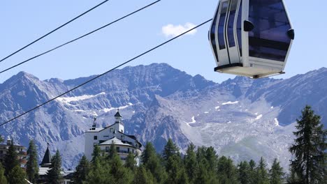 cable car moving through mountainous landscape