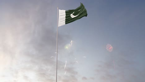bandera de pakistán con fuegos artificiales en el fondo