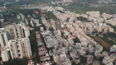 360-degree-turn-An-aerial-view-showing-a-single-intersection-over-a-residential-area-and-commercial-buildings