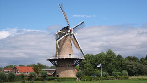 Traditional-windmill-in-operation-in-the-province-of-Zeeland,-Netherlands