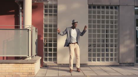 Contemporary-funky-African-American-man-street-dancer-dancing-freestyle-in-the-city