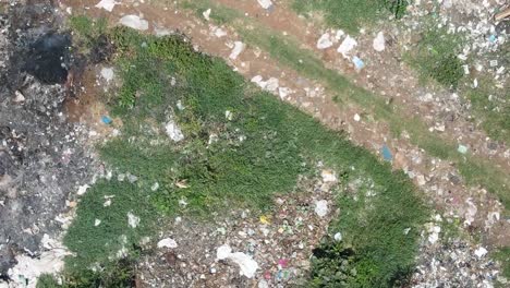 drone flowing down the waste of the plastic bags in the africa kenya