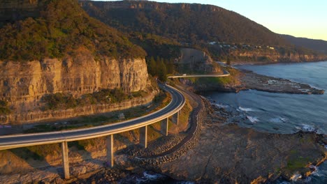 amazing road bridge of sea cliff bridge in the northern illawarra region of new south wales australia - aerial shot