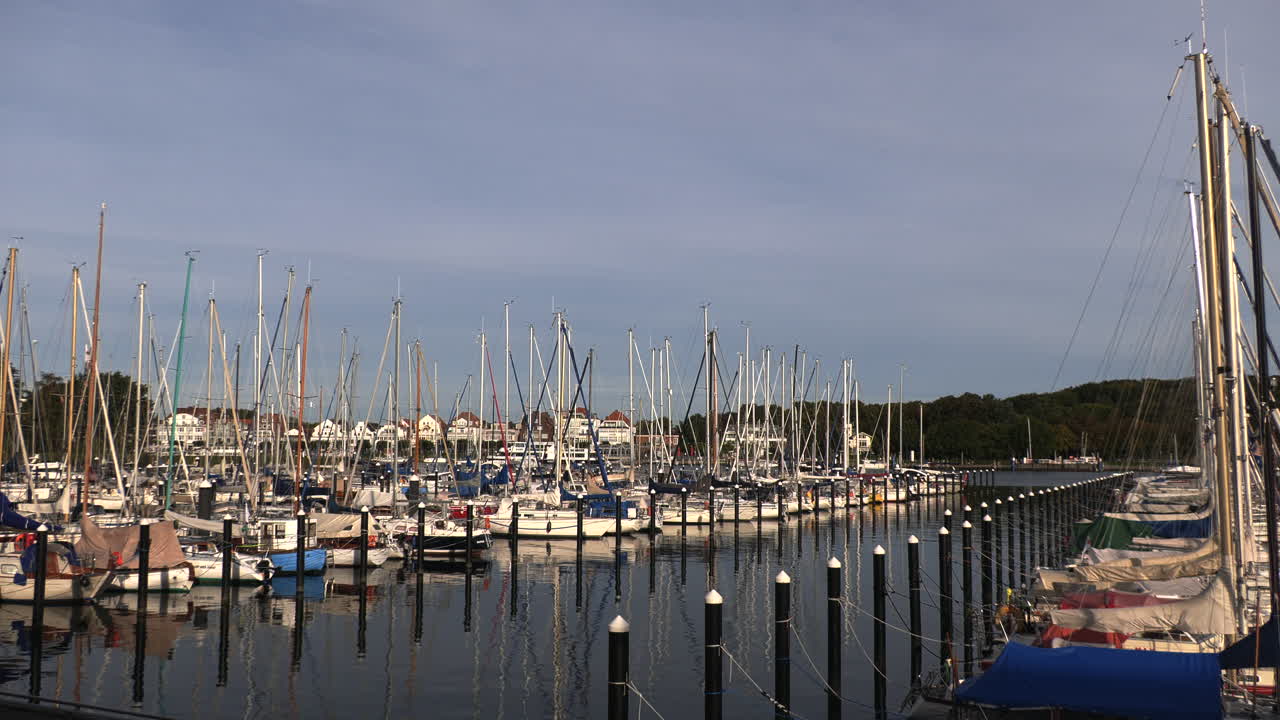 in the marina of Luebeck Travemuende are moored many sailing ships