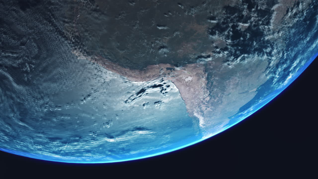 chile sudamérica desde el espacio con la cordillera de los andes visible y la tierra girando lentamente con vista desde la órbita nubes dinámicas mar pacífico y atmósfera