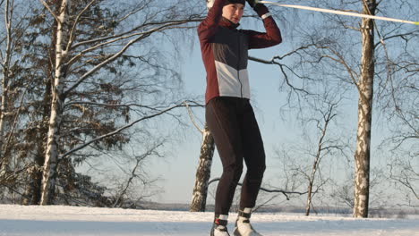 cross-country skiing in a winter forest