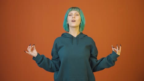 Young-woman-meditating-looking-at-camera.