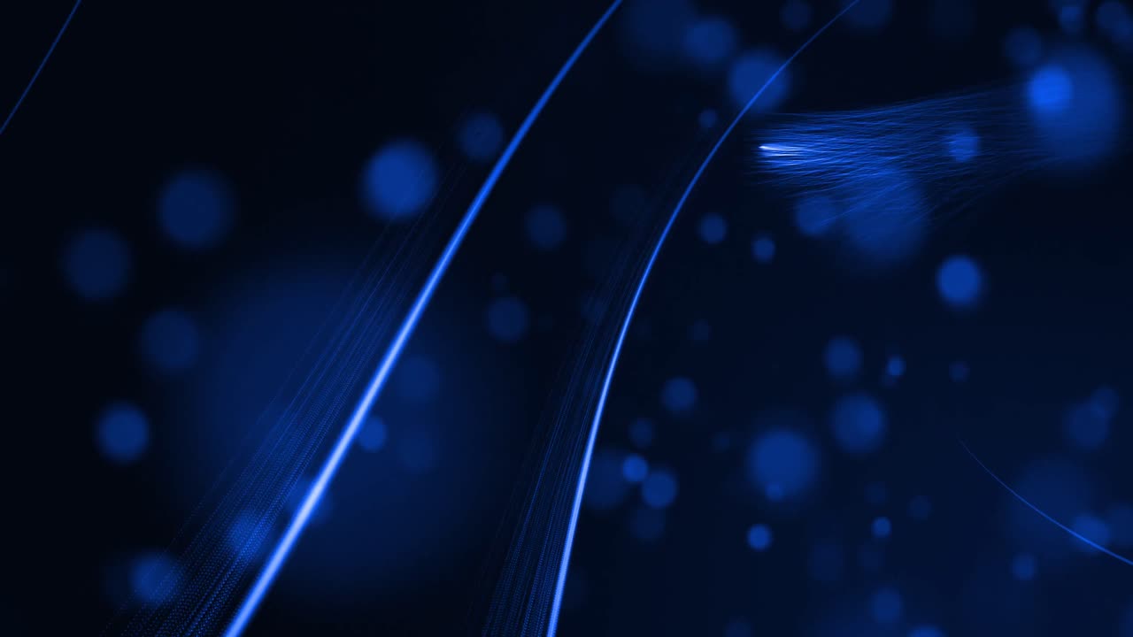 검은 바탕에 구부러진 빛의 빛나는 파란색  ⁇ 과 불분명한 파란색 반점이 있습니다.