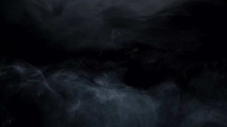 neblina de humo girando sobre un fondo negro 15