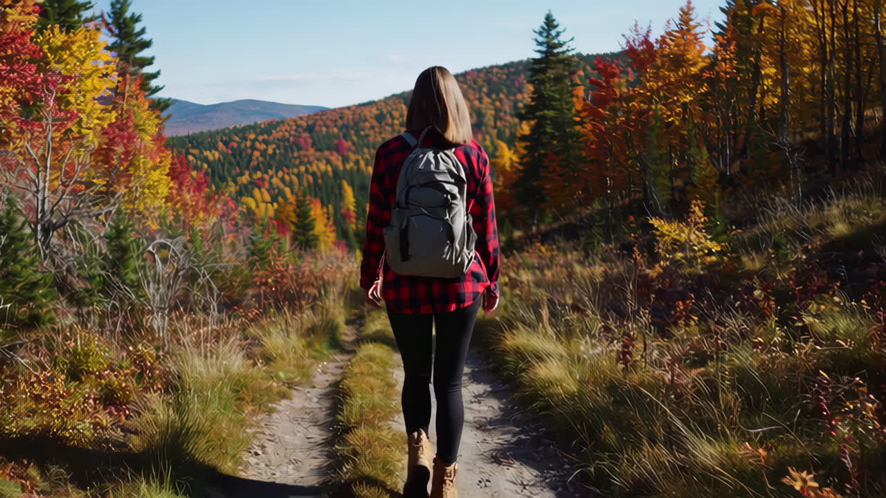 Woman Hiking in Fall Foliage