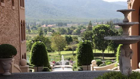 a beautiful garden viewed from a balcony