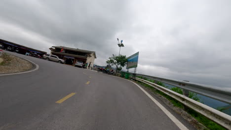 driving on dangerous mountain roads of ha giang loop, vietnam - pov
