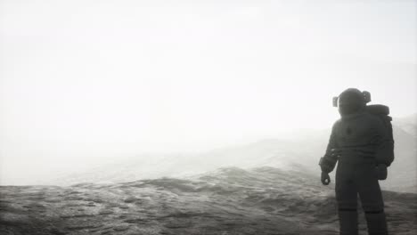 astronaut on another planet with dust and fog