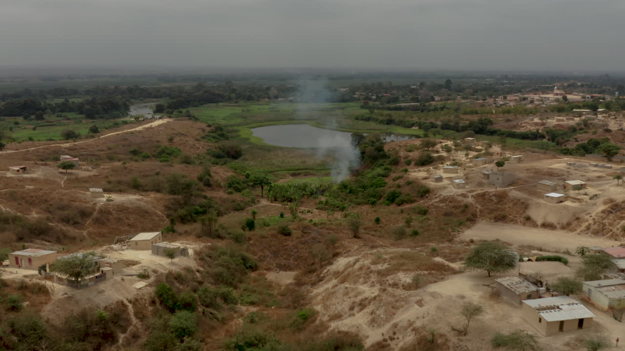 Angola, Flying over a small adobe village, Caxito, Bengo, Africa 2