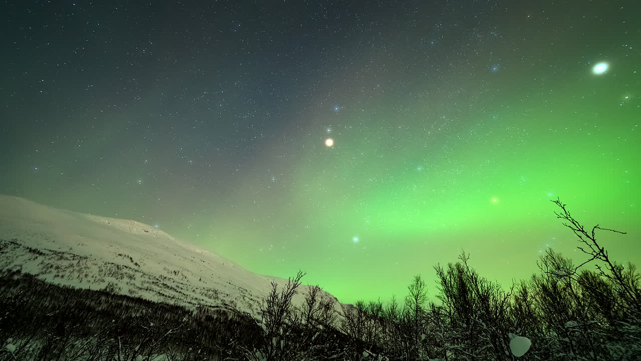 Stunning Scenery Of Aurora Borealis In Night Sky Over Nakkevatnet In Troms, Norway. timelapse