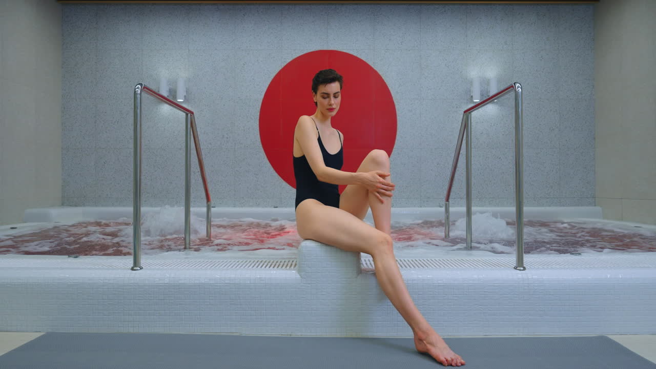 Woman Relaxing in a Modern Spa Hot Tub