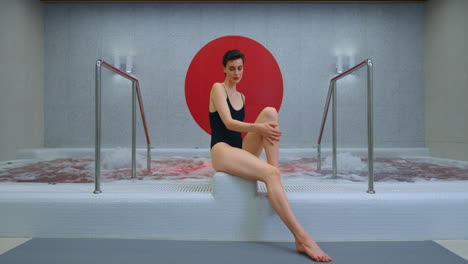 woman relaxing in a modern spa hot tub